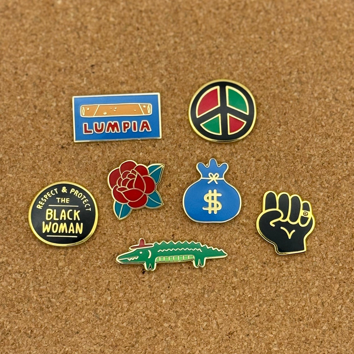Black fist lapel pin